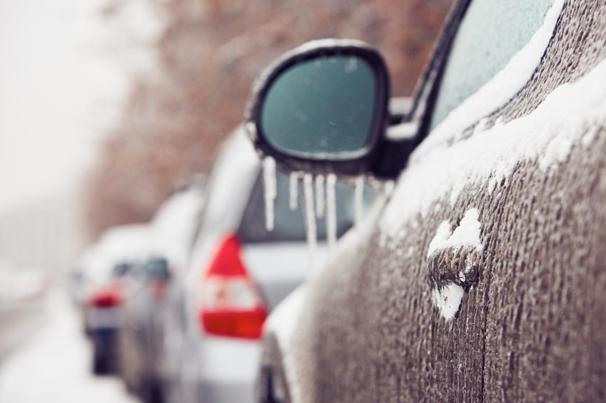 detail of snow and ice on a car