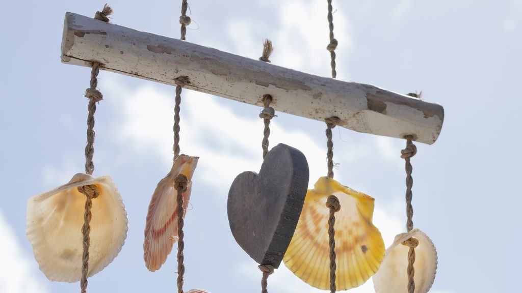 Wind chime made from wood and shells.