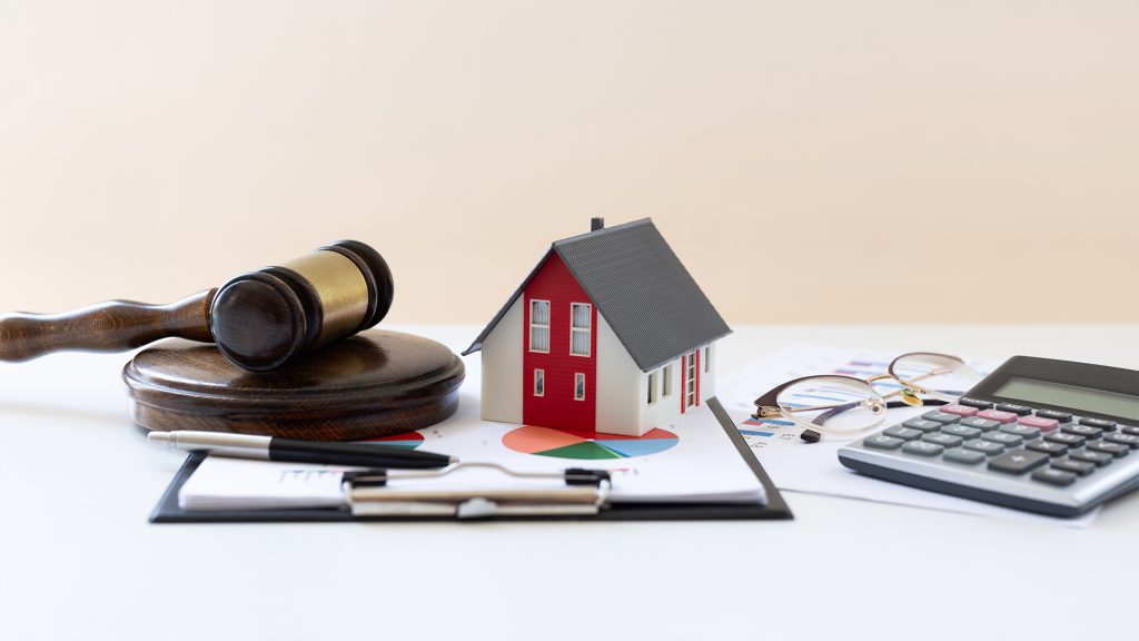 Modal home with other paperwork on a desk.