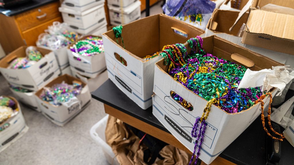 Box of Mardi Gras beads.