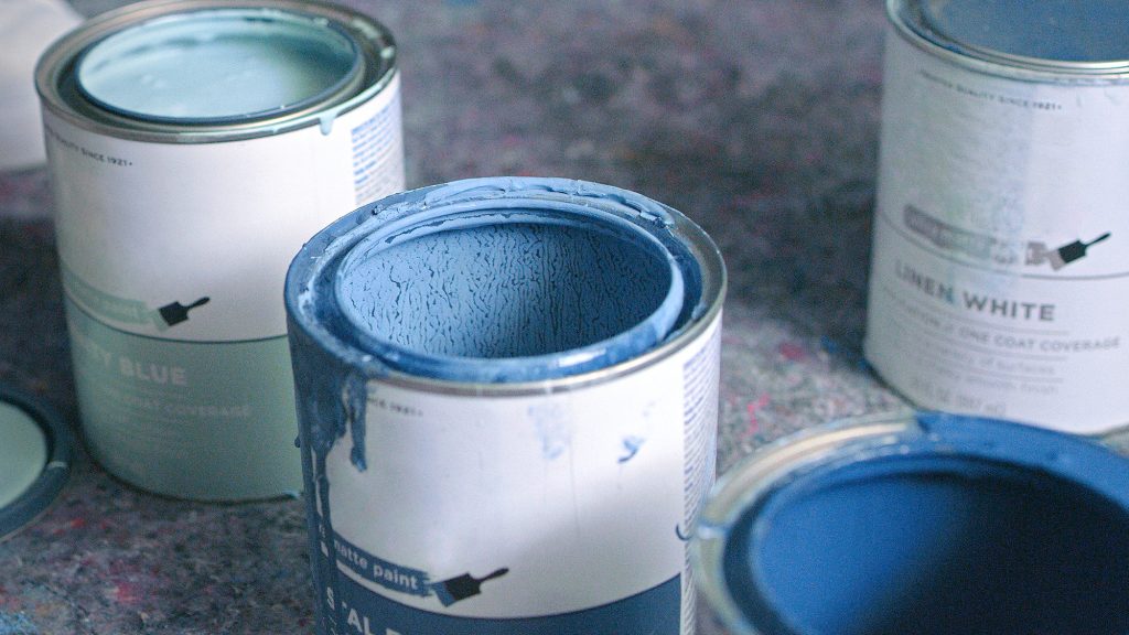 Open containers of paint.
