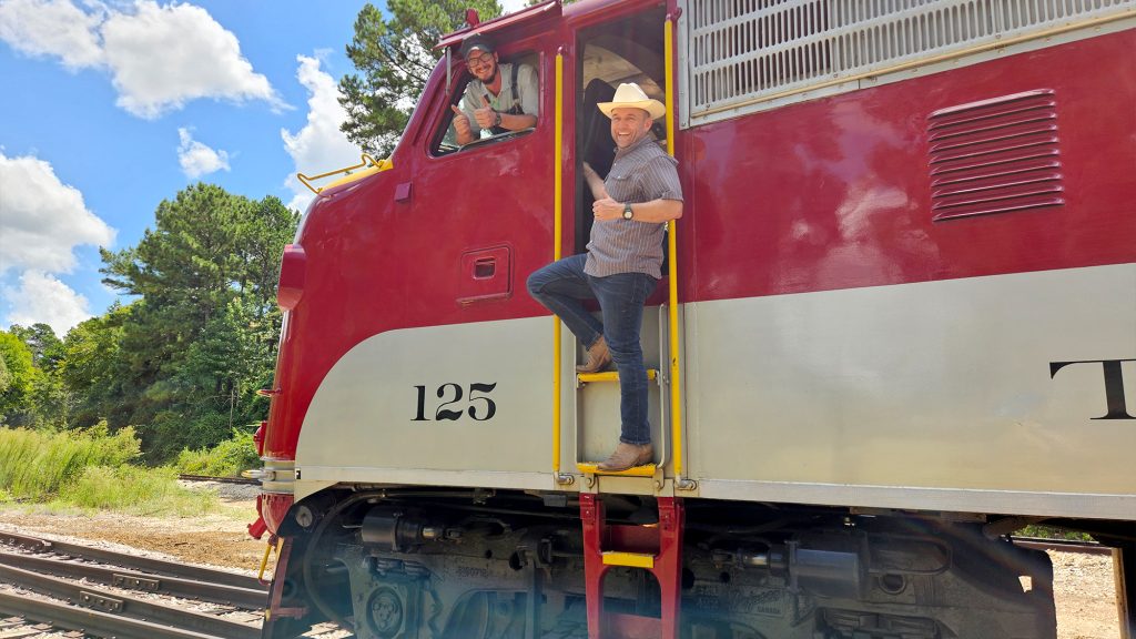 Chet Garner on a train in Rusk.