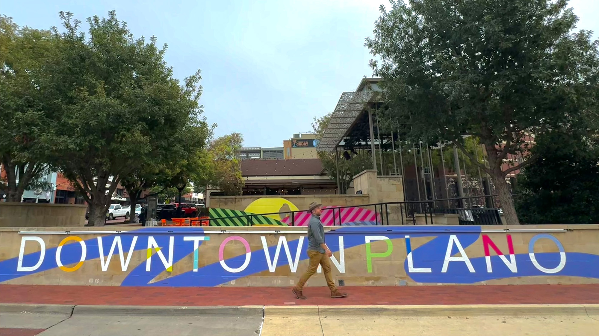 Chet Garner walking through downtown Plano.