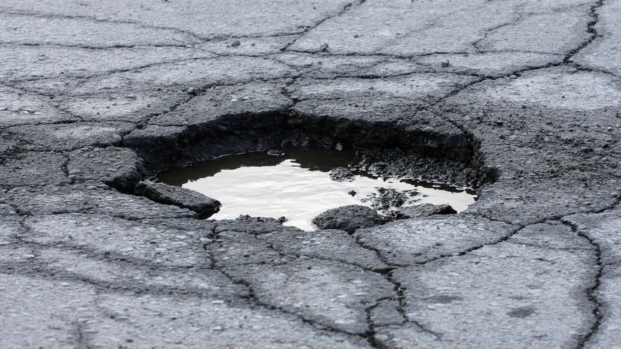 Road with a pothole.