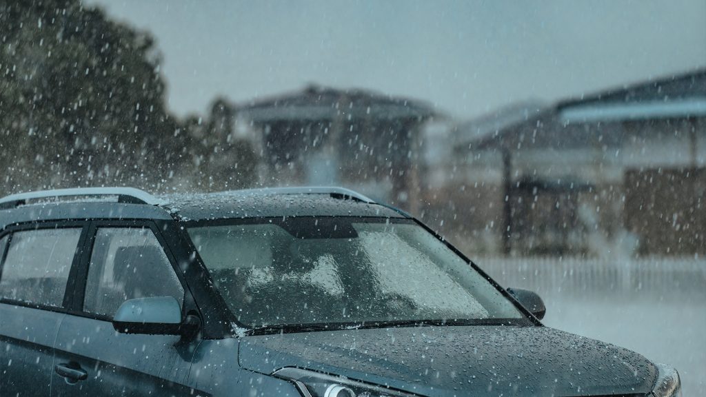 Car in hail storm.