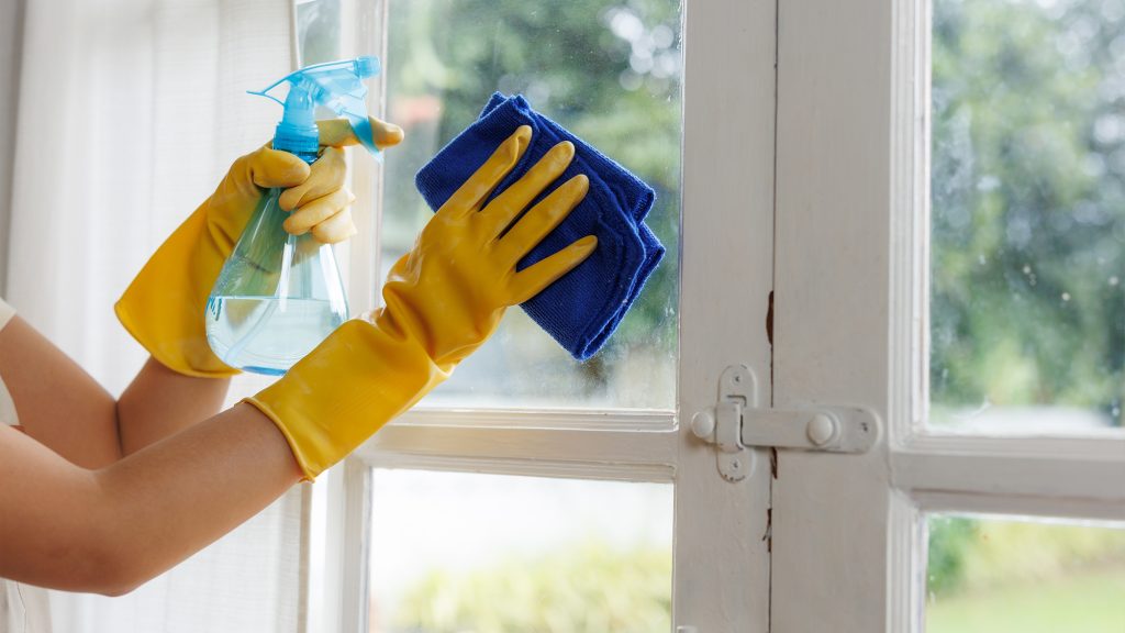 Person cleaning windows.