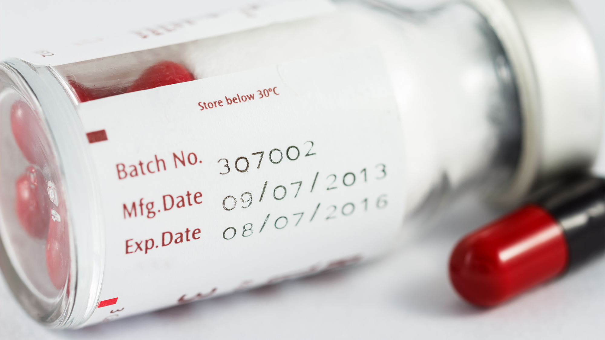 Prescription medication bottle with dates.