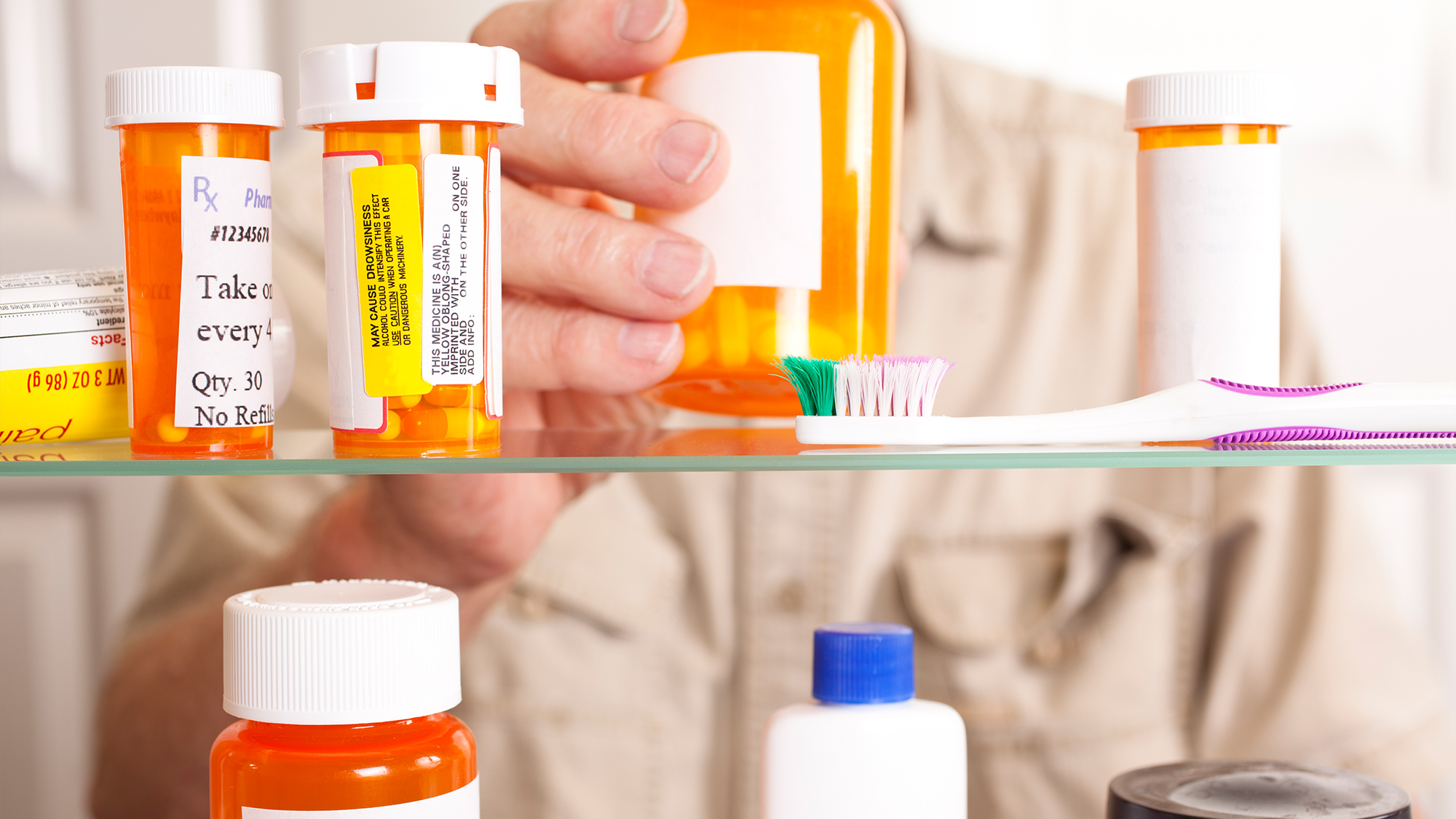 Prescription medications in a cabinet.