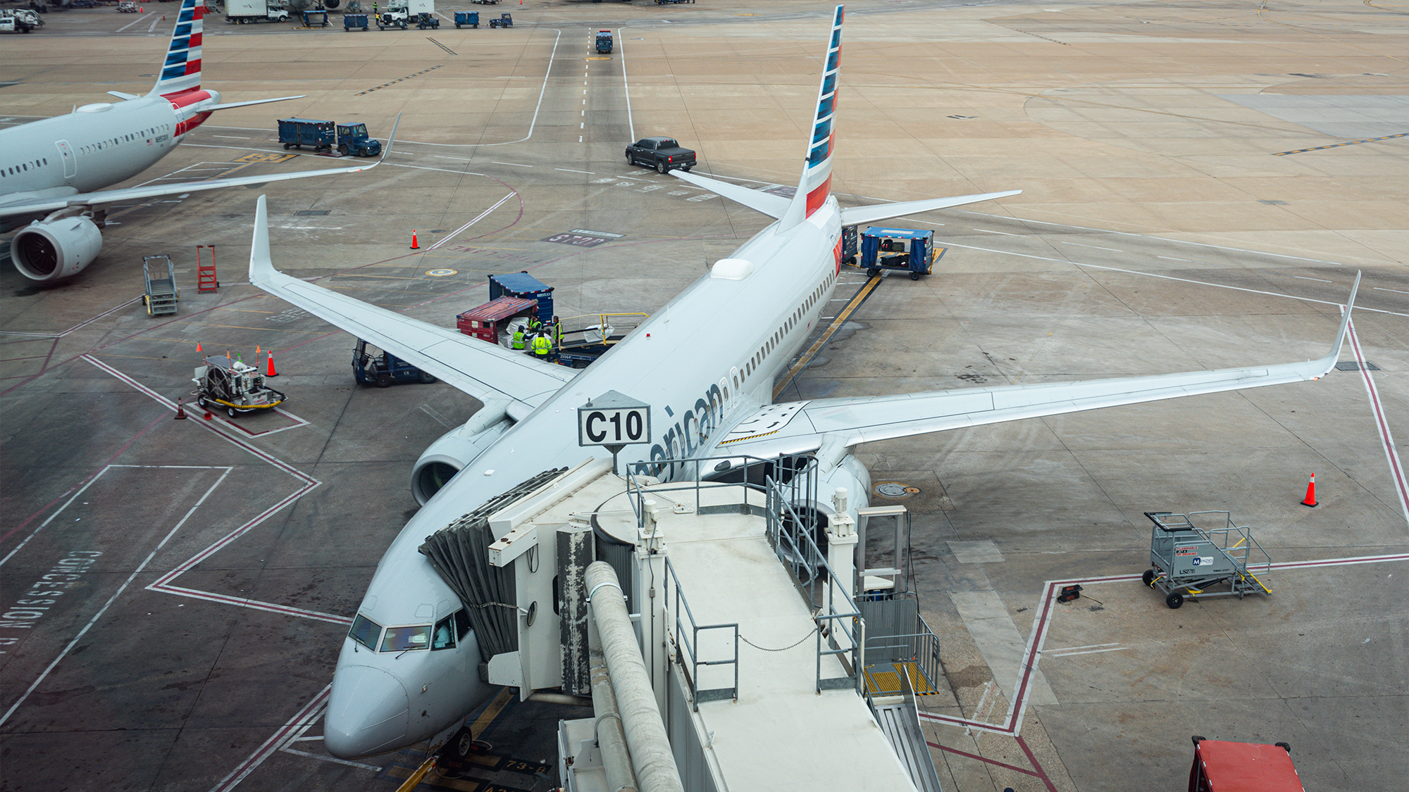 American Airlines planes at DFW Airport gates.