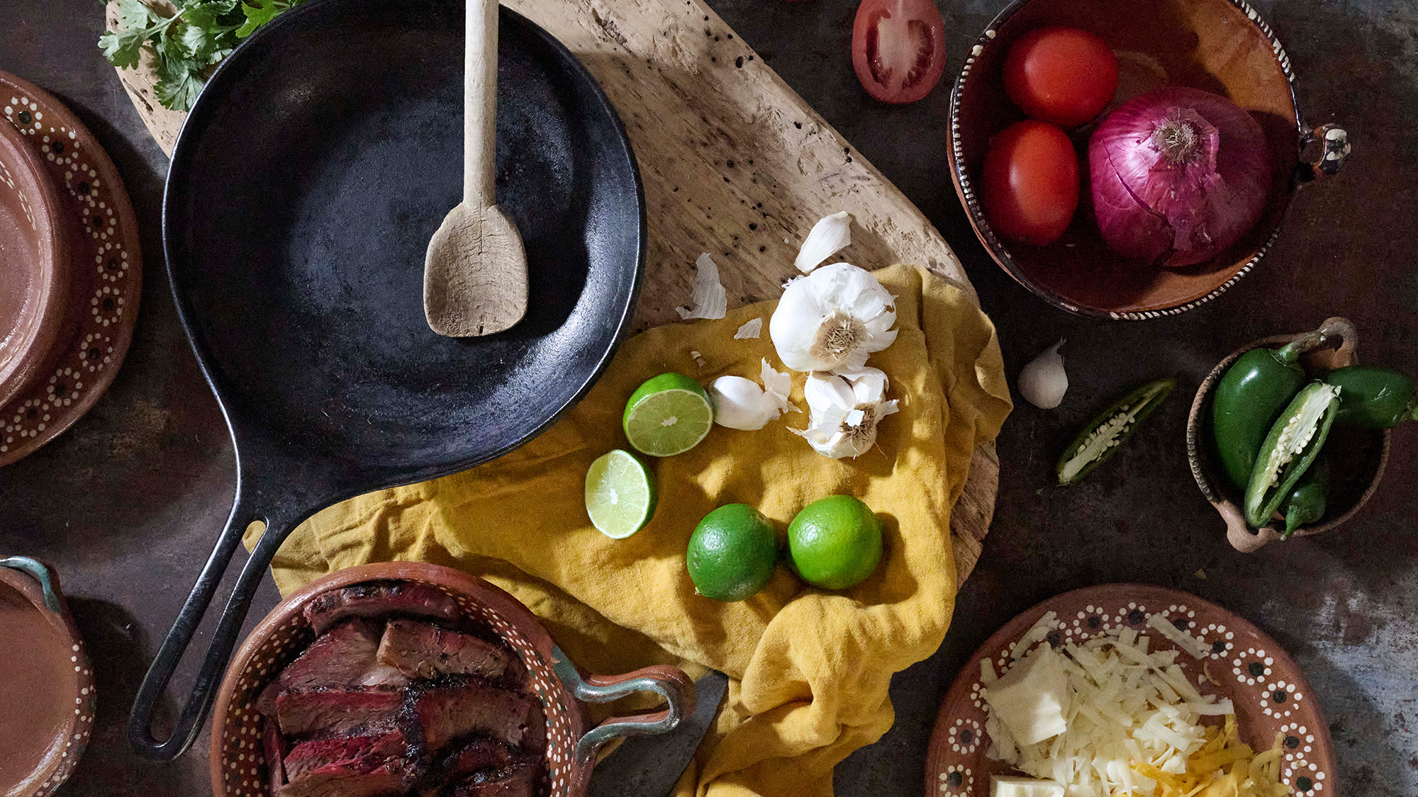 Ingredients for brisket queso on a table.