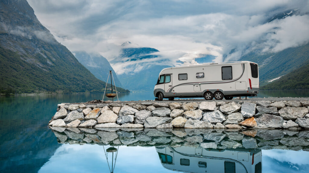 RV next to water.