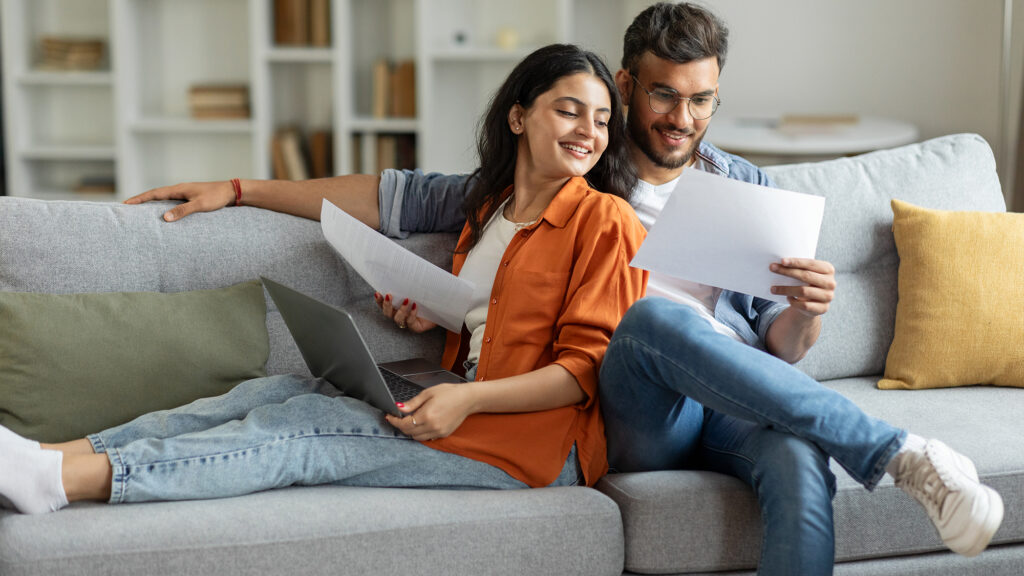 Two people reviewing paperwork.