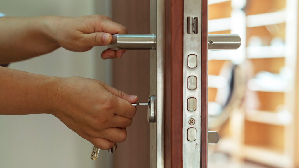 Person locking door.
