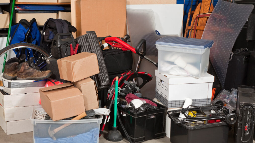 Junk piled in a garge.