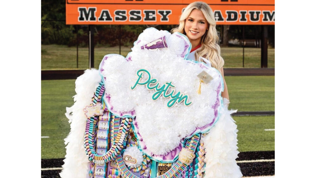 Girl wearing a large mum.