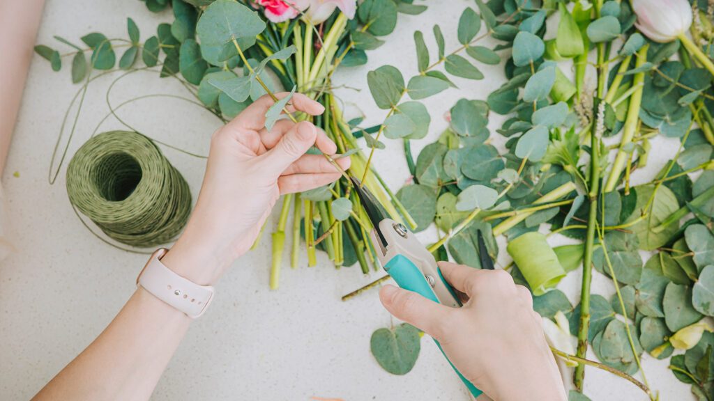 Person cutting flowers.