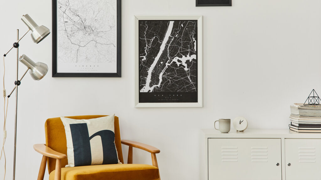 Maps hung on a wall.